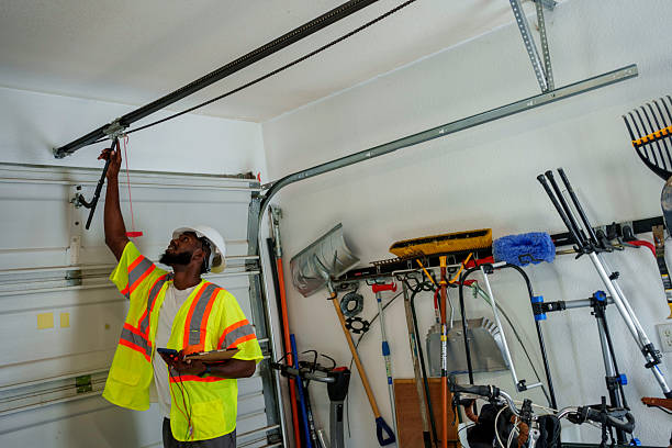 Professional Garage Door Panel Replacement technician working in Spooner, WI